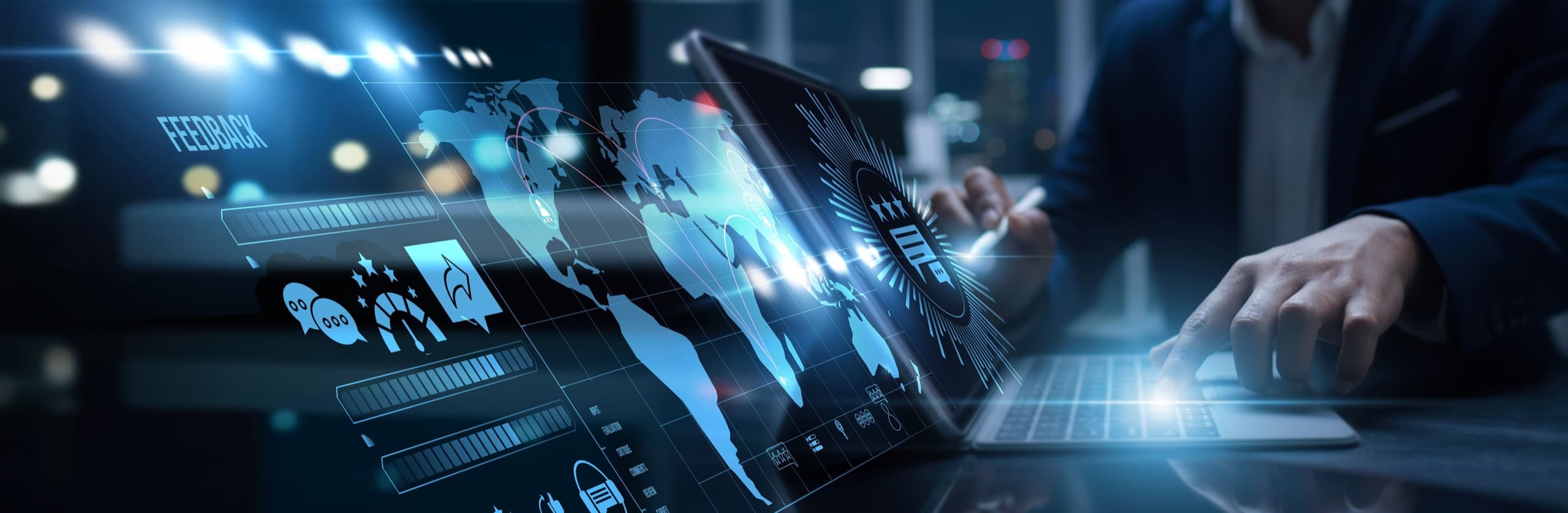 A businessman working with global payroll data on a laptop